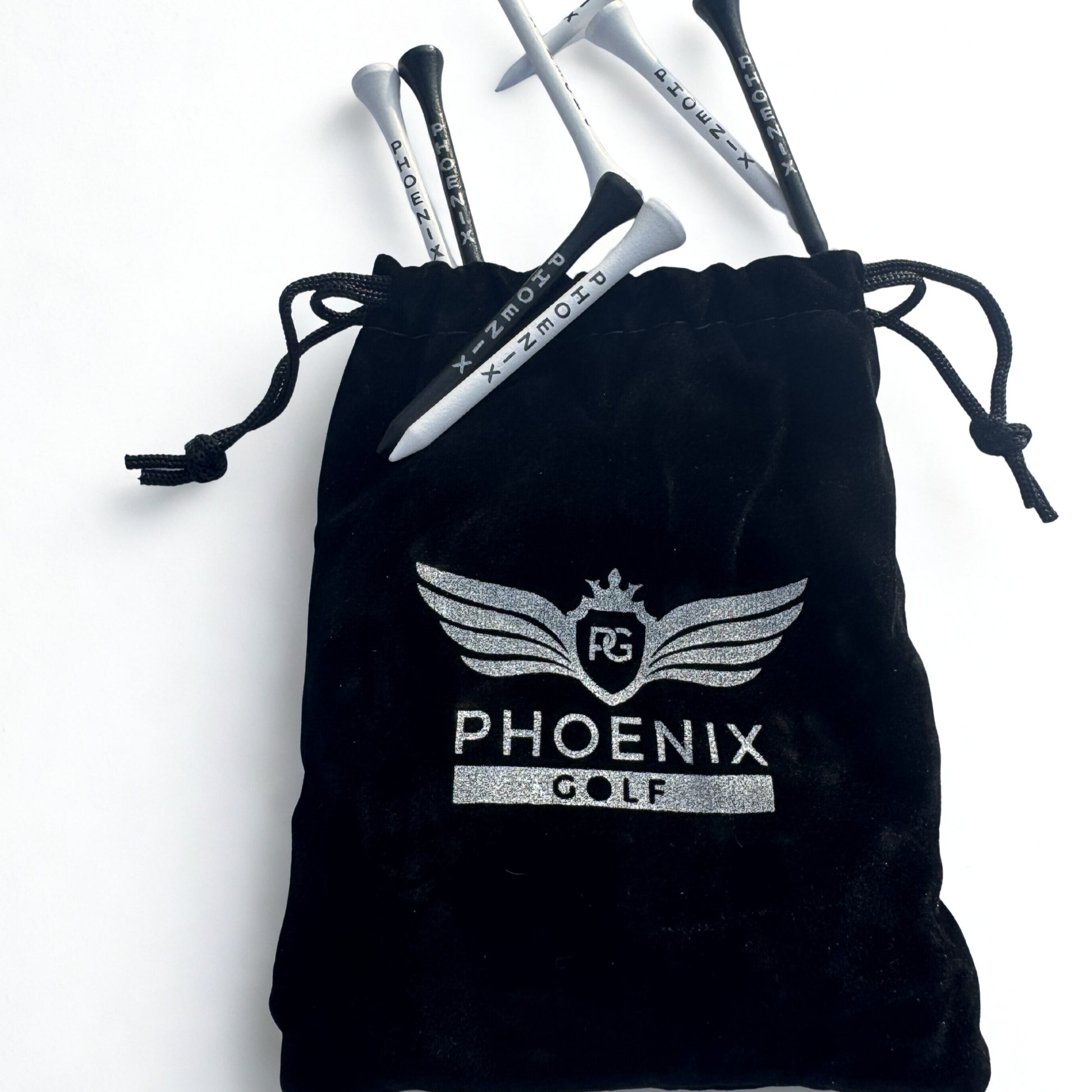 Black velvet drawstring bag with  phoenix golf logo in silver, black and white golf tees with Phoenix written on them on a white background